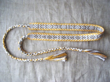 Очелье с символами плодородия.